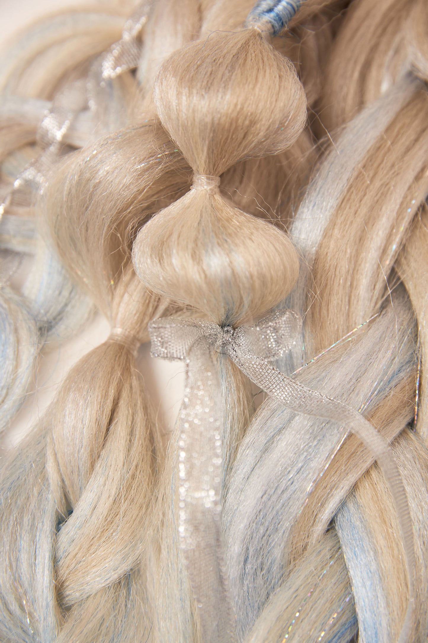 Elsa: One Platinum, Silver, and Light Blue Rave Braid Bundle